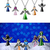 Two examples of coloured crystals angels pendants shots. Above on the white, under a scene with snow and blue bokeh background.