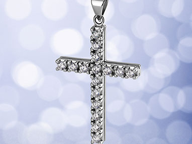 A white gold cross with diamonds, turned slightly to the left. Light blue background with white bokeh. Celestial atmosphere. Vertical.